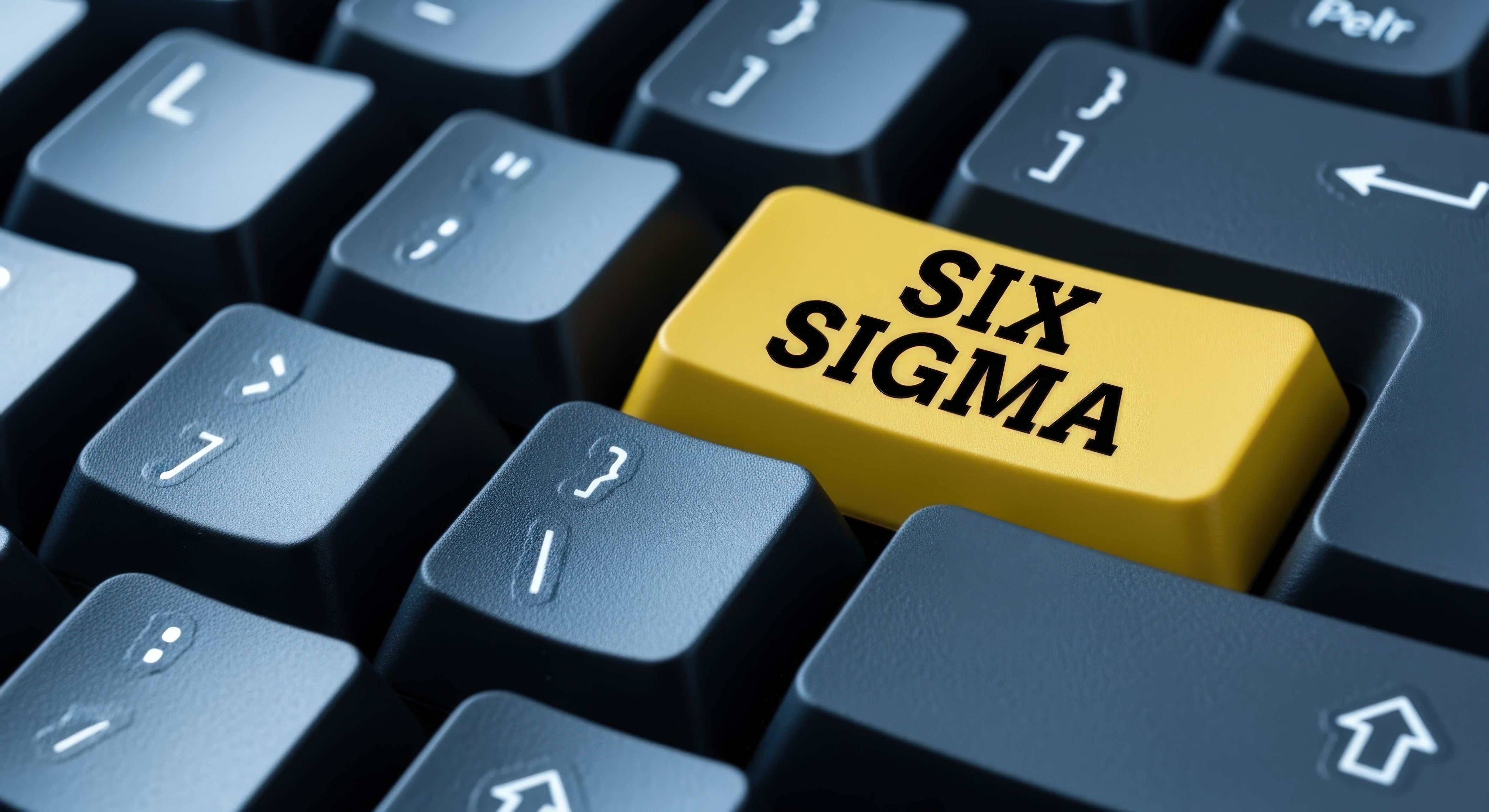 Keyboard Closeup Featuring a Yellow Key with the Text Six Sigma for Business Management Concepts